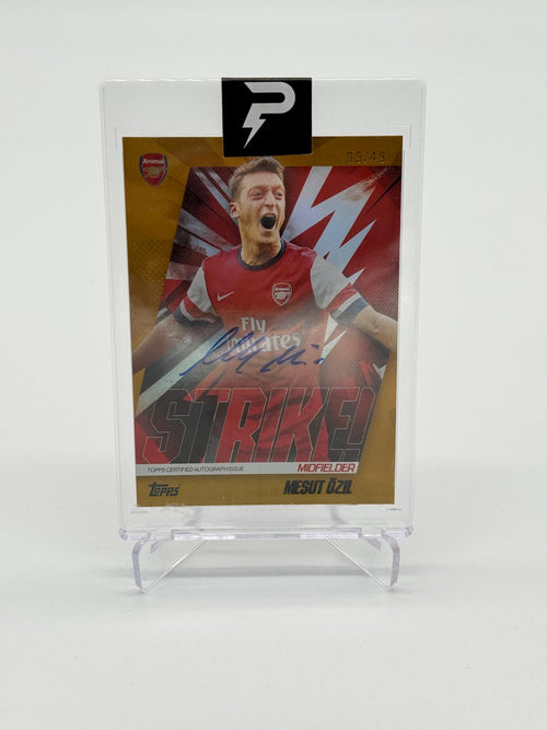 2023-24 Topps Arsenal Team Set Mesut Özil Gold Strike Auto 09/49